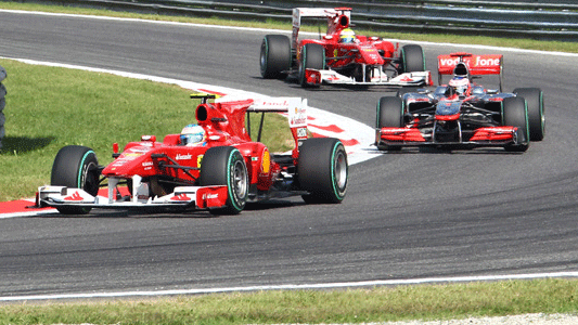 Monza - Gara<br>Alonso batte Button al pit-stop
